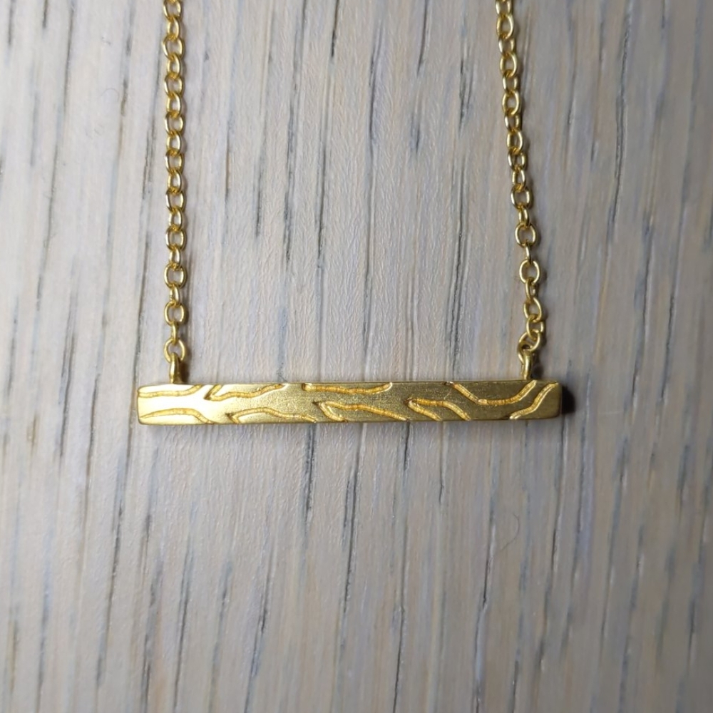 Gold tree bark Satya necklace NWOT